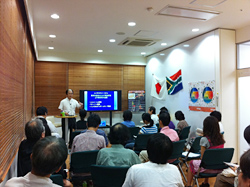 Professor Yamagata lecturing in the Rooibos tea cafe