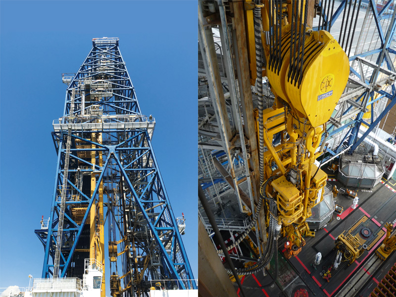 The derrick, a tall steel tower used to hang and run drill pipes.
