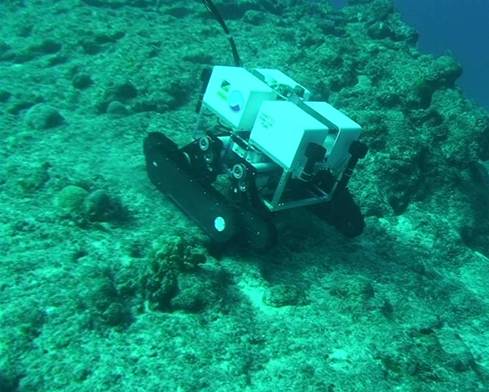 Photo 1 and 2:ROV with the new crawler system on the rugged ocean floor
